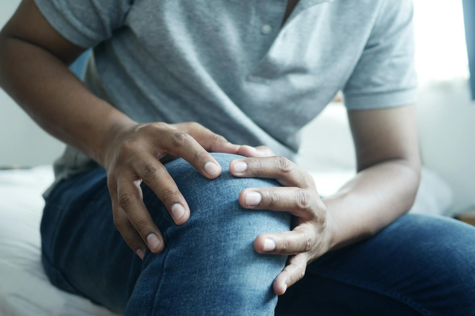 pexels-photo-14534511 | Vivorie | Smart Comfort for Everyday Life a person in gray shirt and blue denim jeans